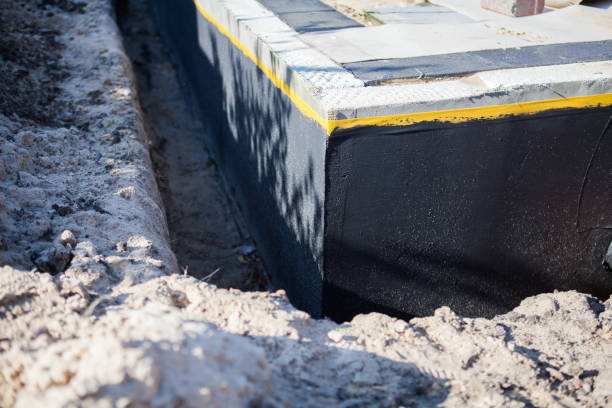 Professional Emergency Waterproofing technician working in Lakemore, OH